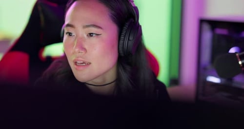 Gaming, asian and woman live streaming with microphone for online video game community in Korea