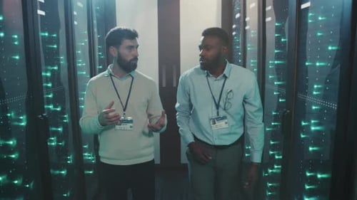 Tech Team Collaborates Skilled Technicians Navigate Server Hall Conducting Maintenance Inspections