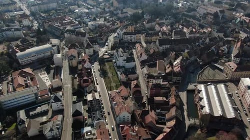 Huge european city from high angle with beautiful mountains on the background, 4k