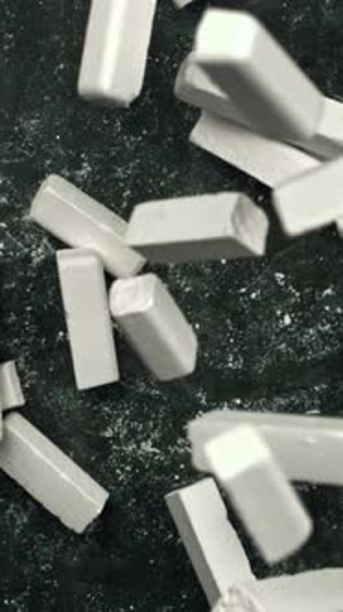 Chalk Falls on the Blackboard Filmed on a Highspeed Camera at 1000 Fps