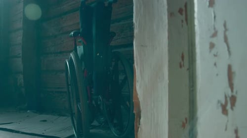 A Disabled Man Assembles a Stroller