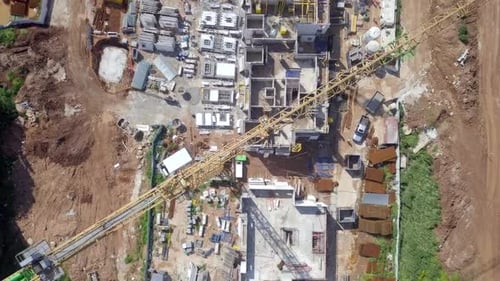 Large residential construction site with cranes, Aerial view