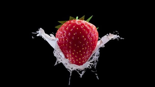 Strawberry Splashing into Milk
