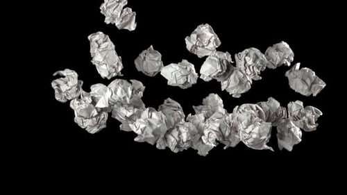 Crumpled Paper Flies and Falls on a Black Background Filmed on a Highspeed Camera at 1000 Fps