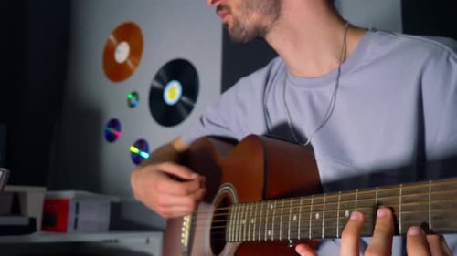 Man Playing Guitar in Studio 2K