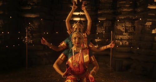 Slow Motion Portrait of Three Expressive Young Indian Dancers Performing Folk Dance Choreog