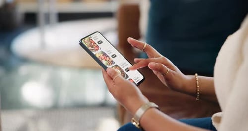 Woman, hands and phone with food menu in home for online shopping, order or takeout