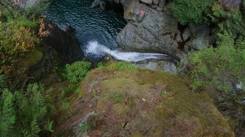 Aerial View of Waterfall in Lush Forest