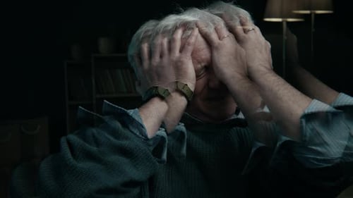 Elderly Man Having Anxiety Attack and Feeling Overwhelmed