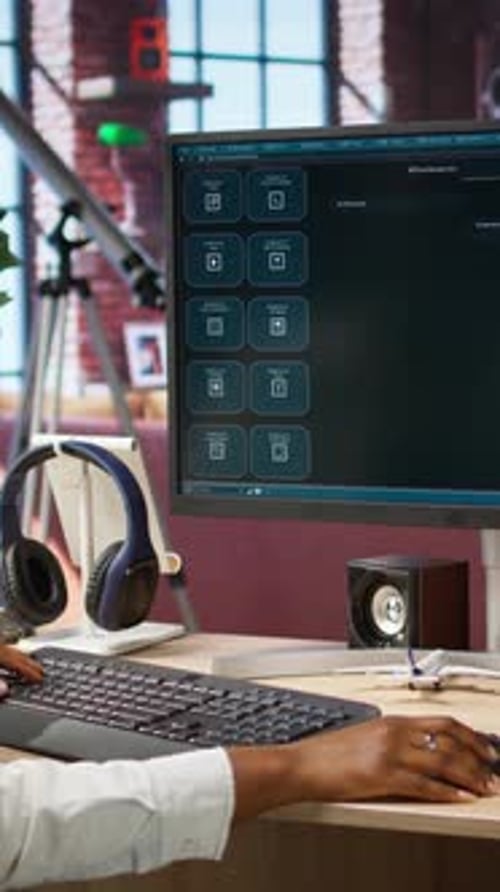 Vertical Video Woman Seated at Desk Using AI LLM Chatbot Software in Modern Urban Home Office