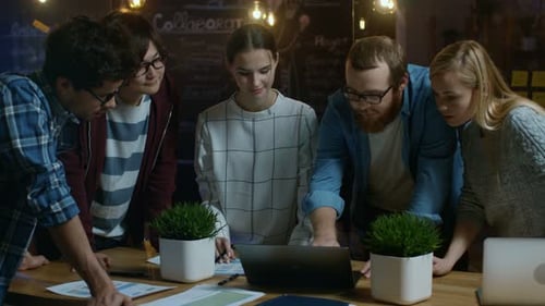 Creative Team Collaboration Around a Table in Office