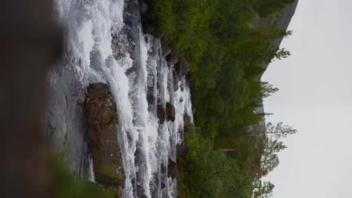 Vertical Screen The Swift and Indomitable Flow of a Mountain River
