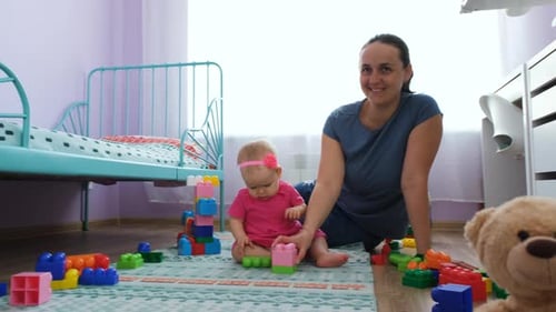 Mother and Infant Play with Building Blocks
