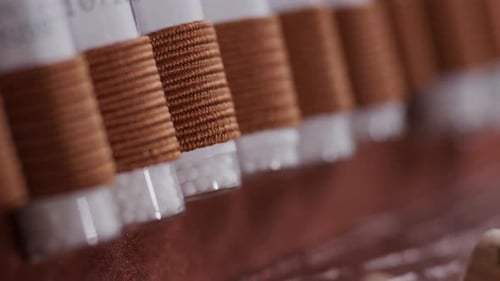 Close up globoli in white glass with focus shift.