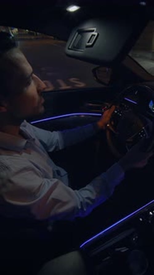 Experience a Relaxing Night Drive in a Modern Car Equipped with Ambient Lighting Features