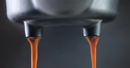 Making Espresso Flowing Fresh Ground Coffee Stream From Professional Machine Close Up