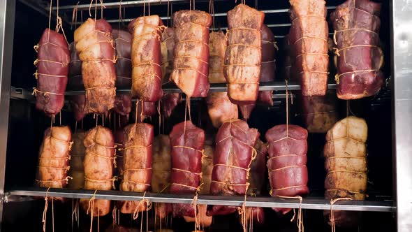 Assorted Meats Curing in a Smokehouse Diverse Cuts of Meat Being Cured ...