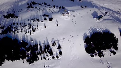 Aerial view of a ski slope in a ski resort in the Tyrolean Alps in Austria