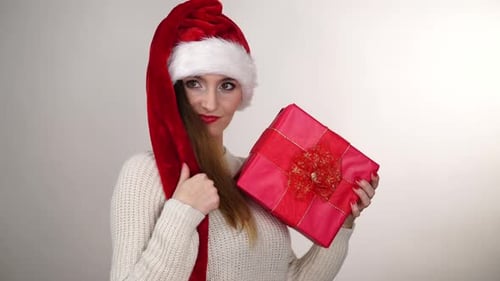 Woman Holding Gift Box For Christmas