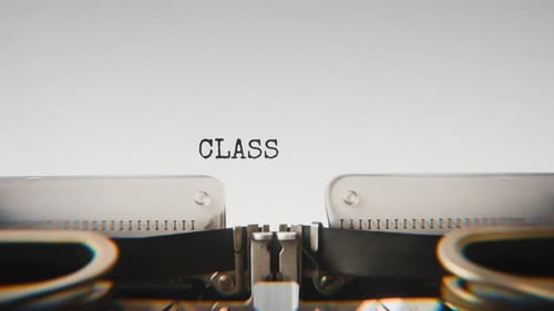 Old mechanical typewriter typing Classroom in a close-up view.