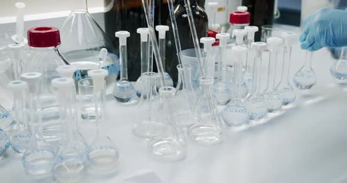 Scientist Working with Test Tubes in a Laboratory