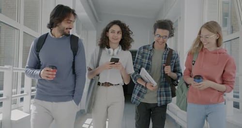 Diverse Group of Students Men and Women Walking in High School Talking Drinking Coffee Carrying