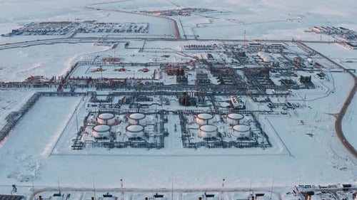 Breathtaking And Aerial View Snow Covered Mountains And Factories