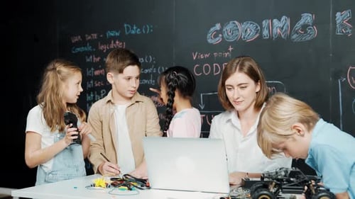 Coding Class with Teacher and Students in Classroom