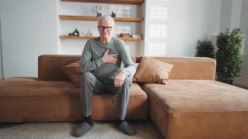 Heart Attack and Hard Breathing Old Man Feeling Pain in Chest Rubbing Ribs Myocardial Infarction