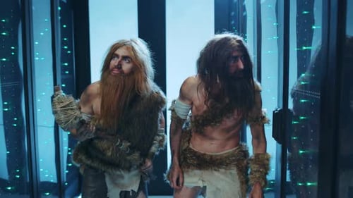 Two men in caveman costumes in data center