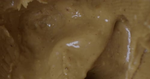 Close Up Pan of the Inside of a Peanut Butter Jar