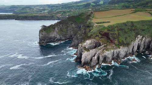 Rugged Volcanic Cliffs and Dark Atlantic Waters on the Coast of Azores