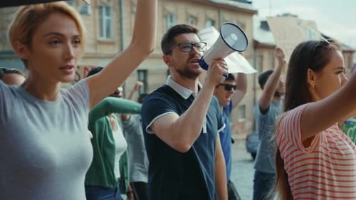 Group of People Protesting in the City