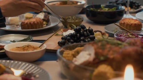 Festive Dining Table with Abundant Food Selection