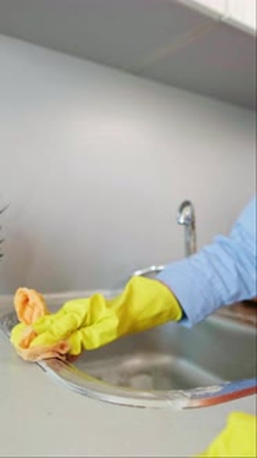 Moment of cleanliness: woman doing a deep clean, removing dust and dirt from every corner of her hom