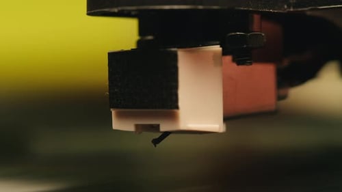 Vinyl Record Player Needle on Spinning Record Close-up