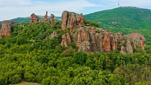 Belogradchik sandstone rock formations in rugged Bulgarian forestry landscape