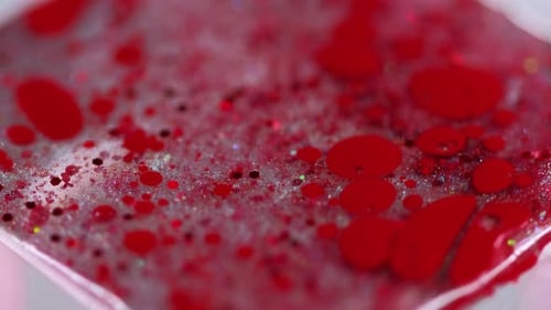 Abstract Red Drops and Glitter Texture
