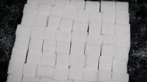Sugar Cubes are Folded in a Square Shape Rotates CloseUp