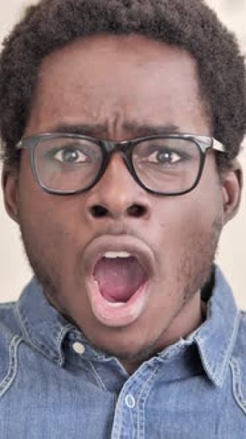 Young Man Yelling at the Camera Close Up