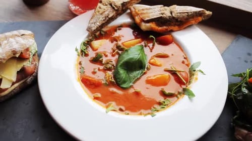 Delicious food offerings, soup, sandwich, and salad