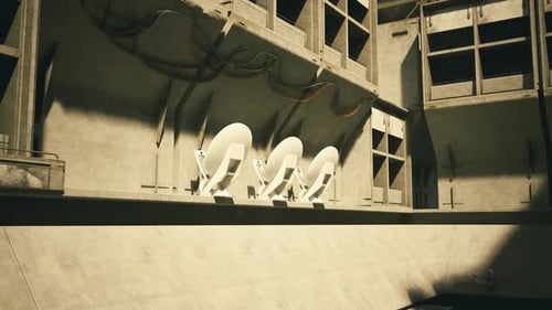 Moody Urban Bench Arrangement Emphasizing Shadows and Geometric Forms