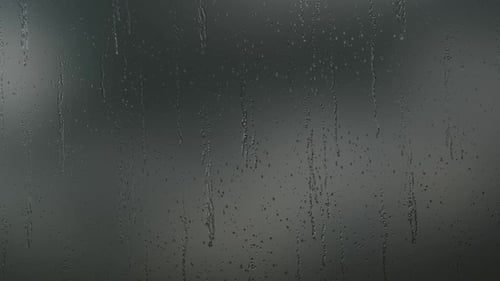 Realistic Rain Drops on Window Glass Loop
