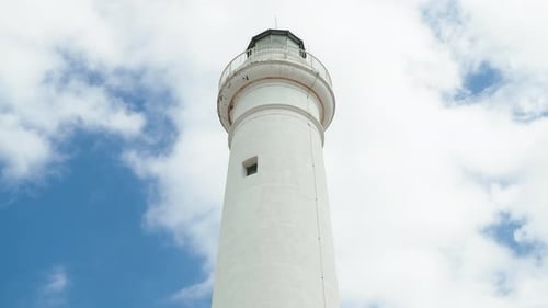 White Tower Lighthouse in Daylight with Clouds