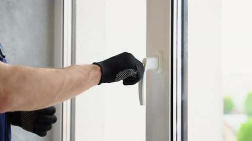 Worker Checks System of a Window Lock in Hotel The Concept of Protecting a Child From Falling Out of
