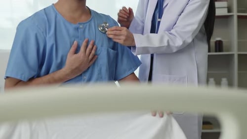 Doctor examining patient by listening lungs and breathing for Acute Respiratory Illness Clinic