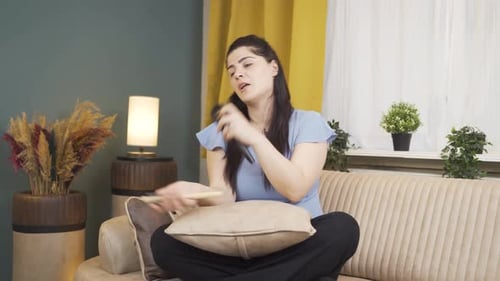 Woman Singing at Home with Hairbrush Microphone