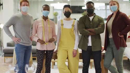 Diverse Team Wearing Masks at the Workplace