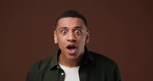 Surprised Man Gasping in Shock and Amazement