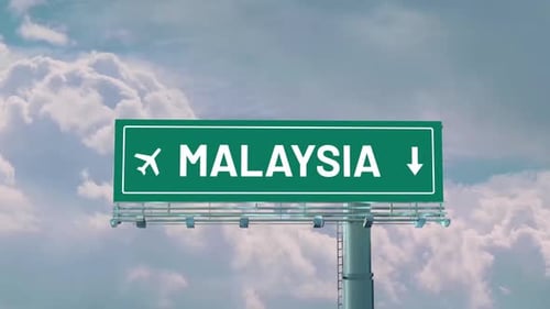 Airplane Arriving To Malaysia Road Sign